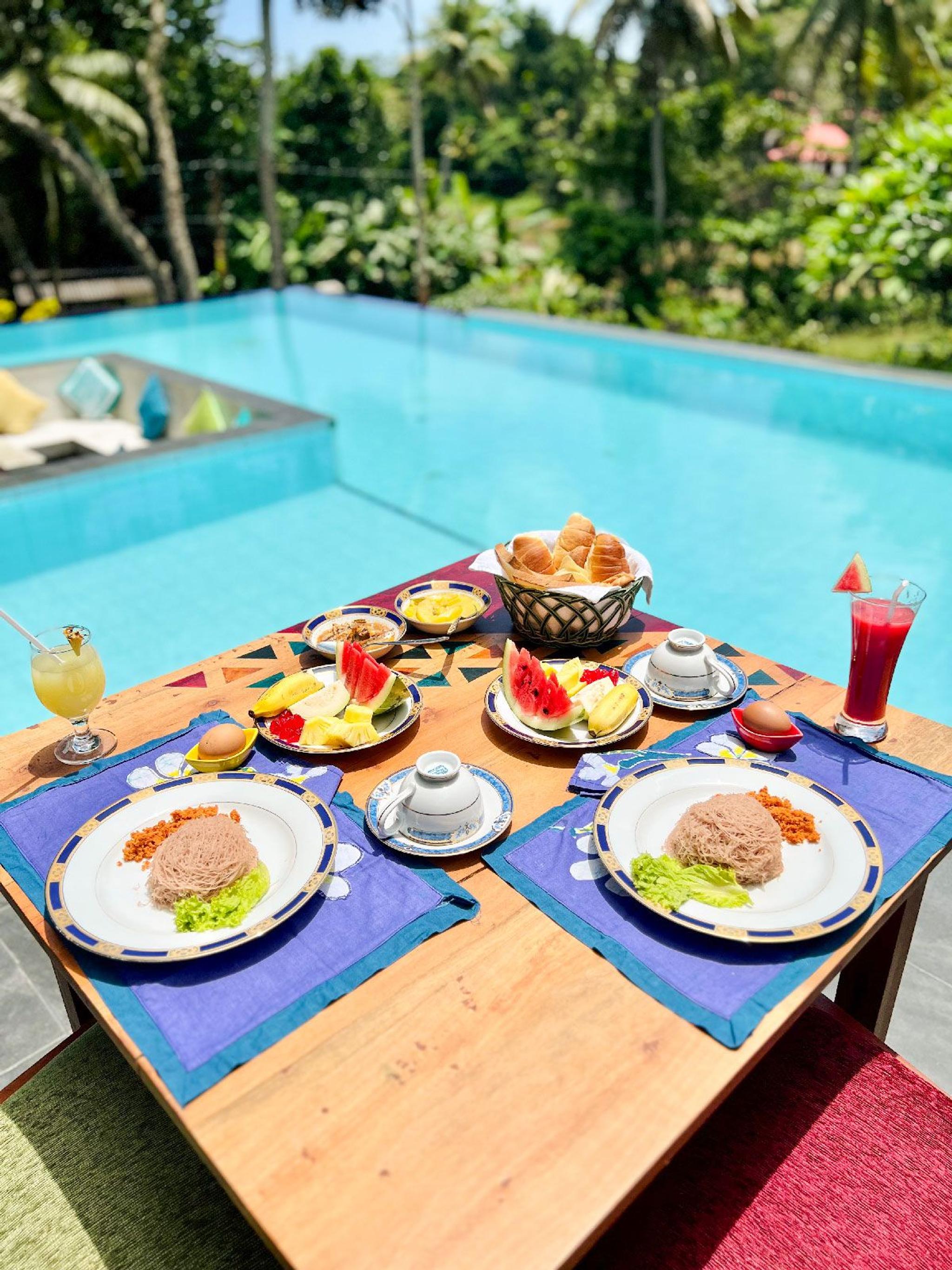 Dining near pool muthunilavillas resort